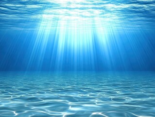 Sunlight beams through tranquil underwater depths.  Calm, clear ocean floor