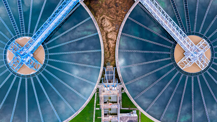 Aerial view circular clarifier tank at wastewater treatment plant, Industrial infrastructure,...