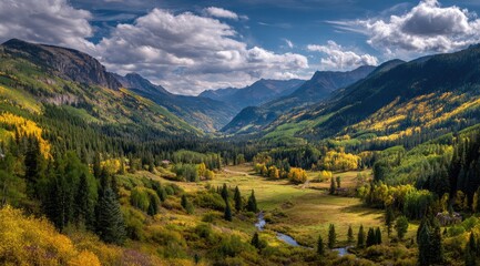 Autumnal mountain valley, vibrant colors.  Vast landscape, scenic views of a valley nestled within towering mountains, with the colorful foliage of autumn. A clear stream meanders through the valley
