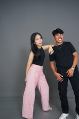 Studio photo of young asian couple face