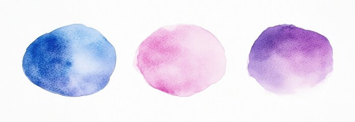 Watercolor circle shapes in shades of blue, pink, and purple