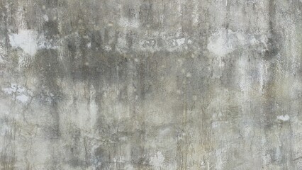 Rough grey concrete wall textured with detailed crack patterns, suitable for background and industrial themes.