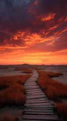 Vibrant sunset over a marsh with a wooden walkway leading into the serene landscape at twilight