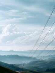 Obraz premium A serene landscape featuring rolling hills and soft clouds, evoking tranquility and peacefulness in nature.