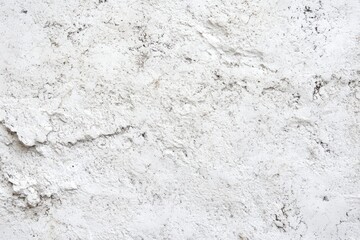 Fototapeta premium Textured white stucco wall surface, showing uneven application and slight imperfections
