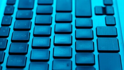 Close up View of Blue Backlit Computer Keyboard Keys
