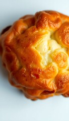 close up of a pastry on a white surface
