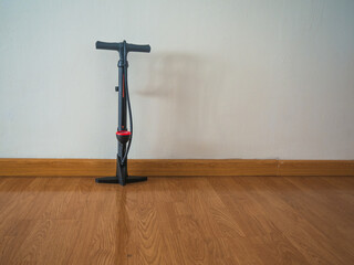 Floor Pump Centered on Wooden Floor