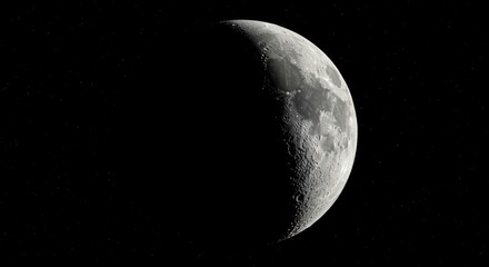 Naklejka premium Crescent moon in a dark sky shows craters and texture.