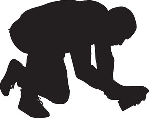  vector silhouette,man painting on the floor with spray on white background