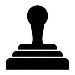Black silhouette illustration of a traditional rubber stamp with handle and base