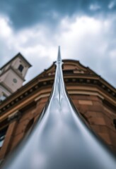 very tall building with a clock tower in the background