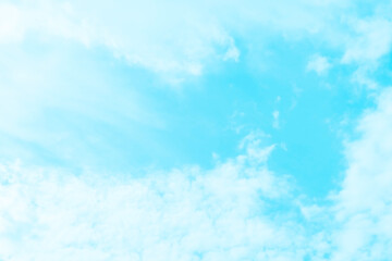 Blue pastel sky with white fluffy cloud. Cumulus clouds background. Cloudscape morning sky. The concepts of freedom of life, never give up and positive though energy.