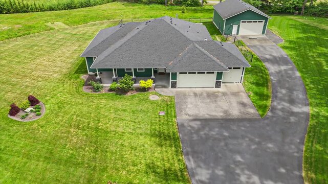Aerial high-speed approach of an American rambler style suburban home with tiny planet effect, zooming in to a For Sale sign in the yard
