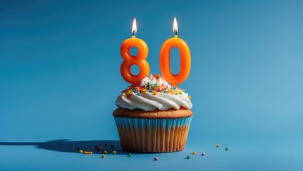 Blue background featuring a burning number 80 candle and a cupcake for birthday decoration