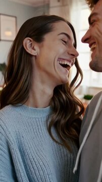 Joyful Couple Sharing an Intimate Laugh in a Bright Living Room Lifestyle Portrait Video
