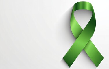 Green ribbon on white backdrop. Medical,Mental health awareness month design layout banner.Psychological and emotional well-being.template with copy space