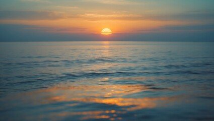 Obraz premium Dramatic sunset over the seaside with bright orange and yellow sky, peaceful ocean backdrop