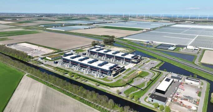 data center, computing center, hyperscaler, computer servers, cloud services, it services, aerial view. Building exterior.