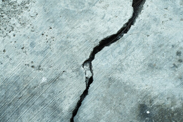 Cracked concrete splitting diagonally