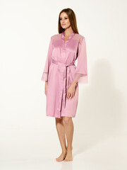 Sexy girl model in a beautiful swimsuit, fashion shooting in the studio.