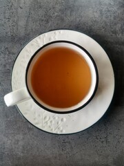 top view, White ceramic tea cup on a table