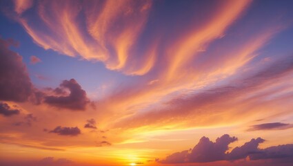 Dramatic and scenic sky with clouds in a colorful sunset