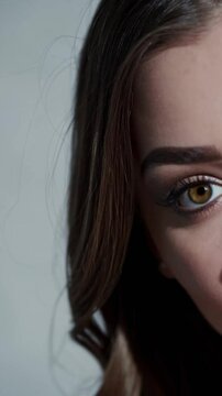 Close-Up of Woman&rsquo;s Enchanting Gaze with Soft Natural Lighting