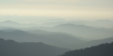 Obraz premium Rolling Hills: The soft, muted hues of a majestic mountain range, captured in a serene landscape of layered ridges, evoke a sense of calmness and vastness.