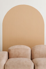 Interior of light modern living room with beige couch