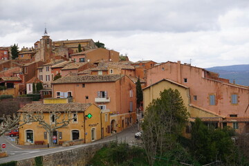 colorful old buildings in the village of Roussillon, France