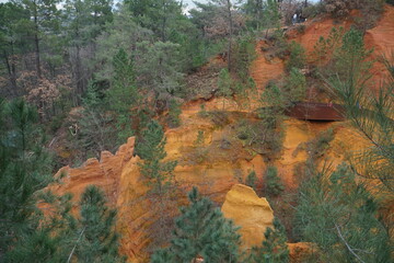 View of the colorful ocher rocks  in Roussillon, France on a cloudy day
