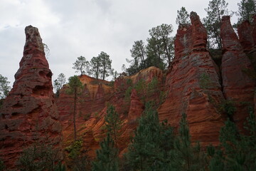 View of the colorful ocher rocks  in Roussillon, France on a cloudy day