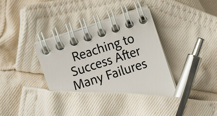 A notebook with a pen on it that says Reaching to succeed after many failures