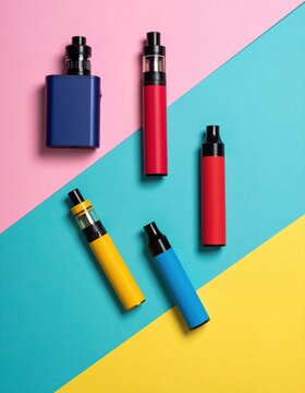 Colorful vapes on geometric background: vape devices in red, blue, and yellow