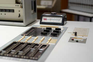 Vintage control panel showcased in a museum, highlighting historical technology and engineering advancements of the mid-20th century