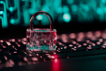 Translucent Padlock Symbolizing Digital Security on Illuminated Keyboard Display