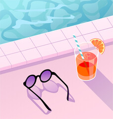 Cocktail and sunglasses on the pool