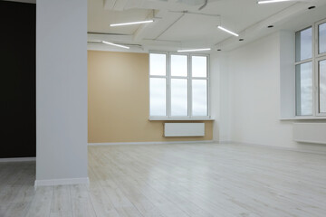 New empty room with clean windows and light walls