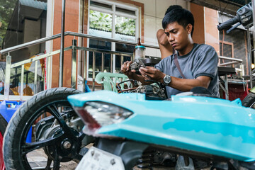 Motorcycle repair work highlighting focus and precision