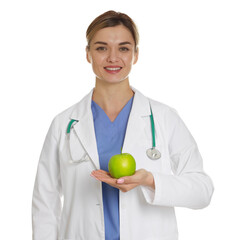 Nutritionist with green apple and stethoscope on white background