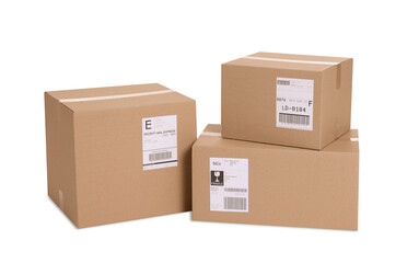 Many parcels with shipment labels isolated on white