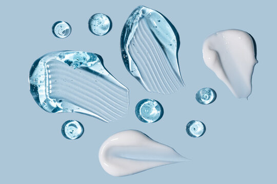 Skincare Gel and Cream Smears on Light Blue Background