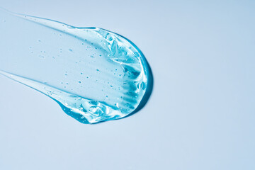 Blue gel texture with bubbles on light background