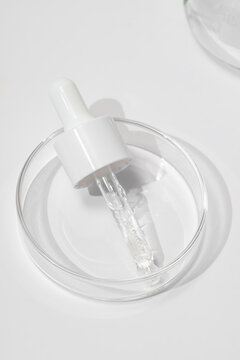 Dropper pipette with clear serum in laboratory setting
