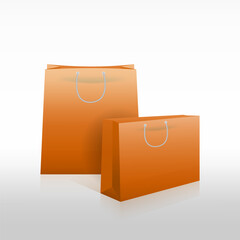 Orange color paper shopping bags mockup set isolated on white background.