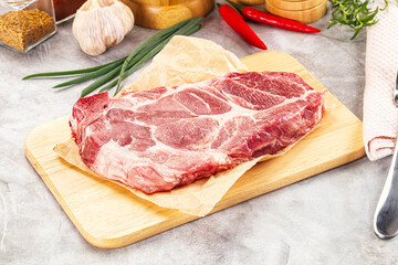 Raw pork neck steak for grill