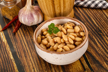 Baked white canned beans in the bowl