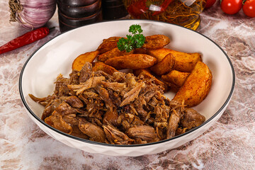 Baked shredded pork with potato