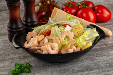 Tasty caesar salad with prawn